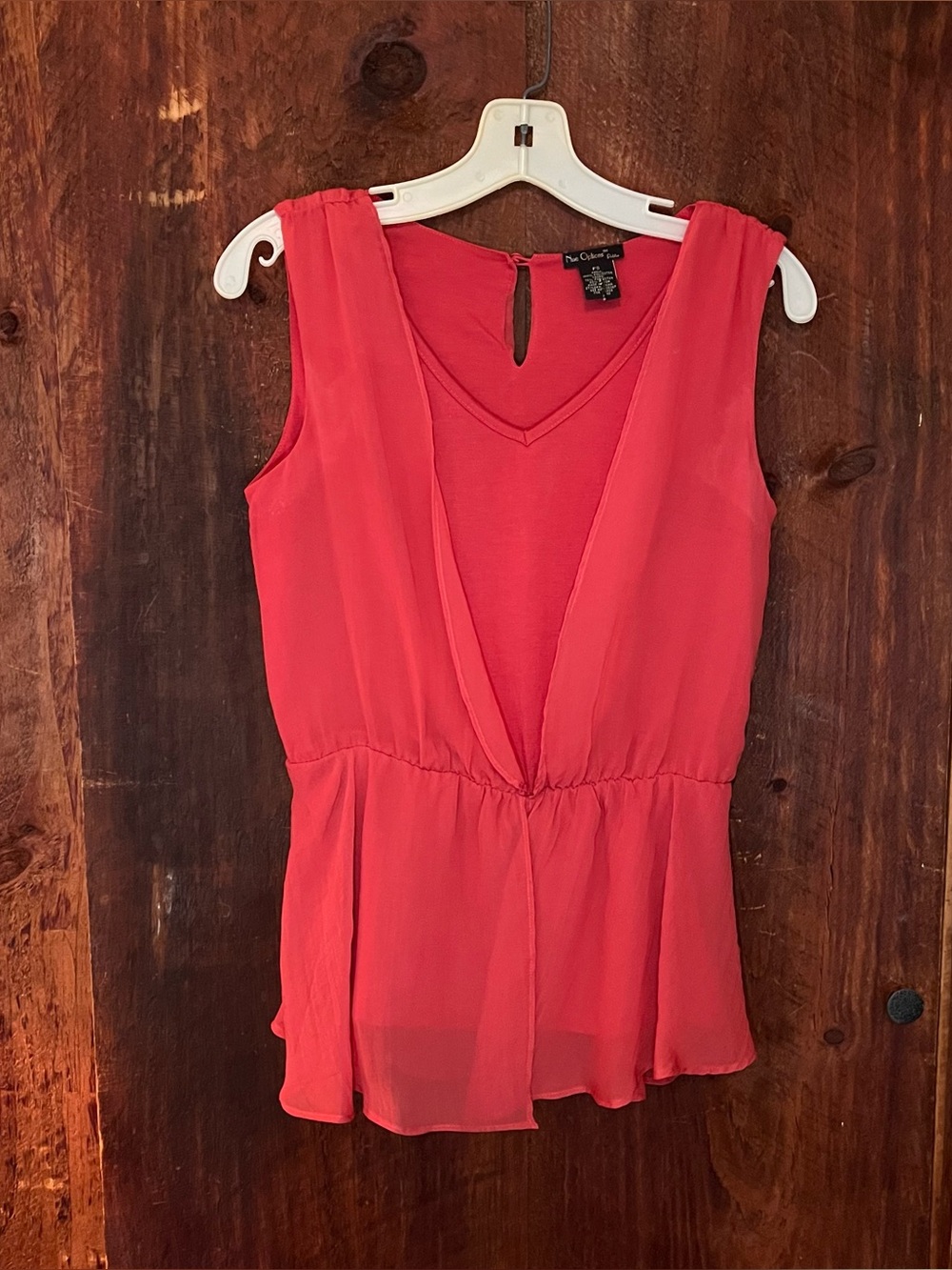 Nue Options Coral Sleeveless V-Neck Peplum Camisole